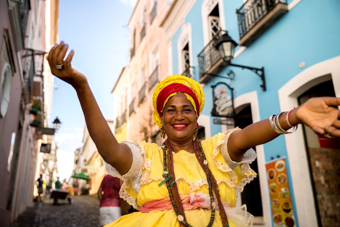 Beautiful Brazilian woman "Baiana" with local costume in Pelourinho, Salvador, Bahia